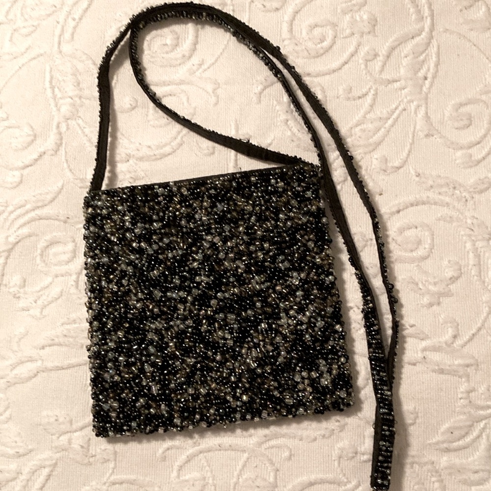 Beautiful multi-colored evening bag. NWOT